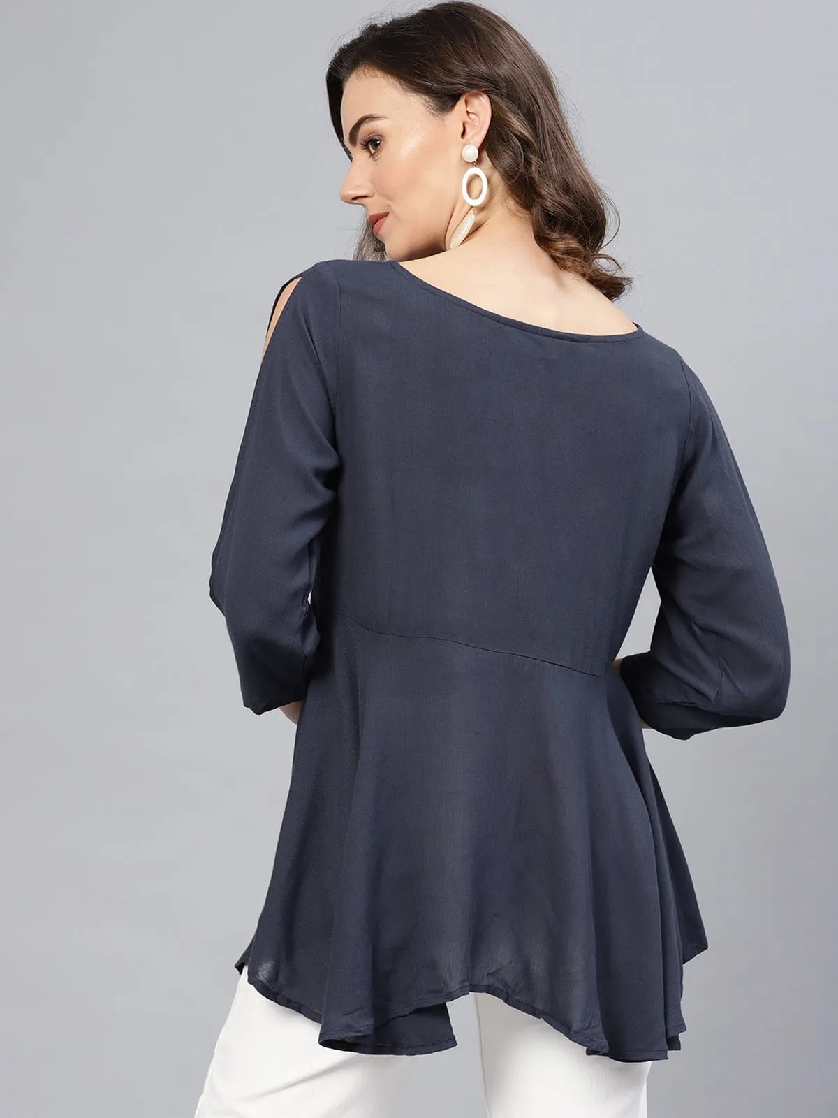 Embroidered Peplum Top